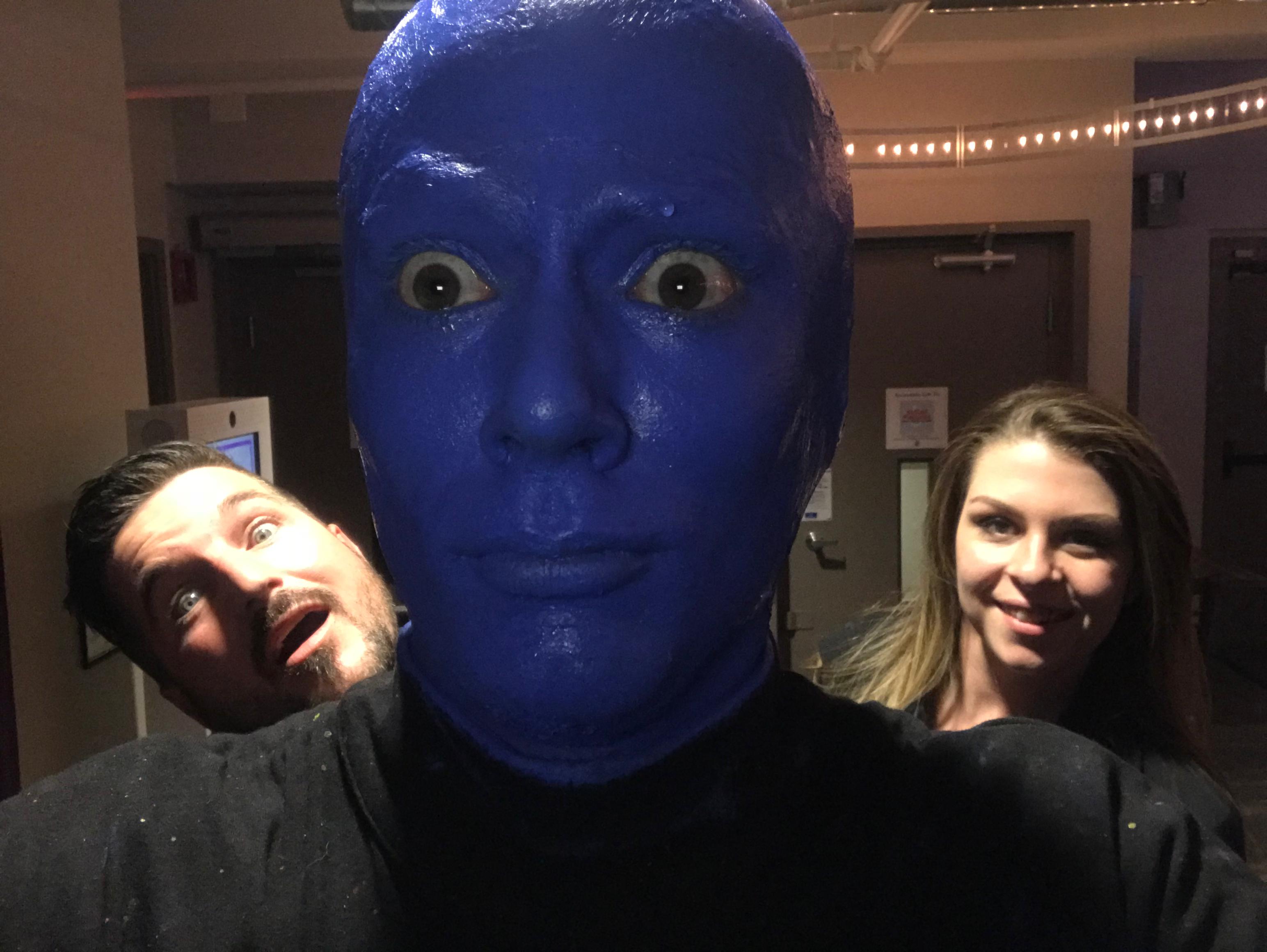 Barry Billcliff at an entertainment event with a blue stage character from his archive