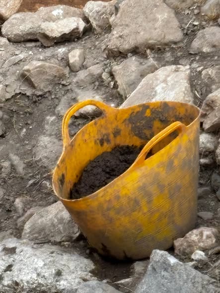 Close view of excavation bucket and stone ground from Barry Billcliff's Facebook travel archive