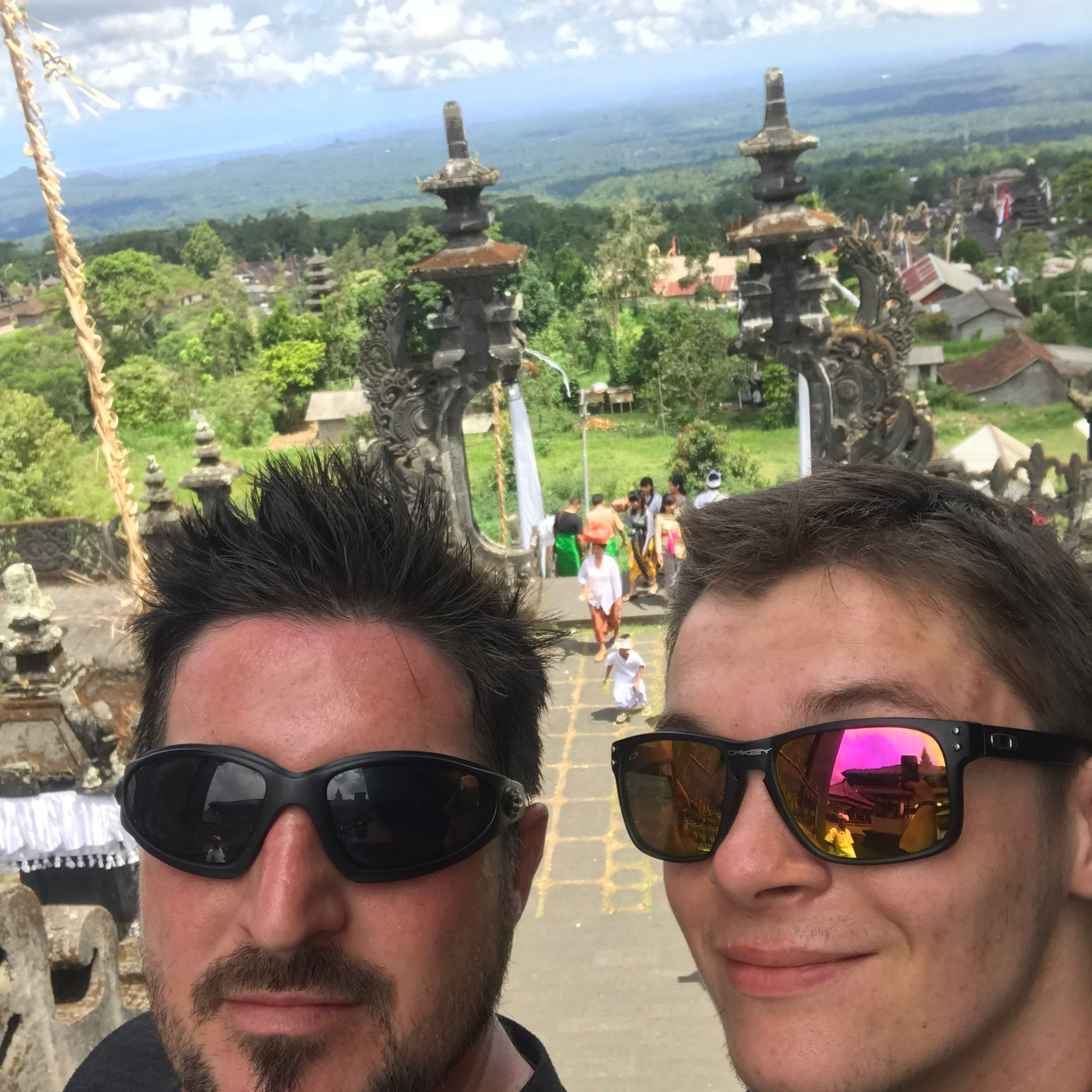 Barry Billcliff travel selfie at temple gates in Bali, Indonesia