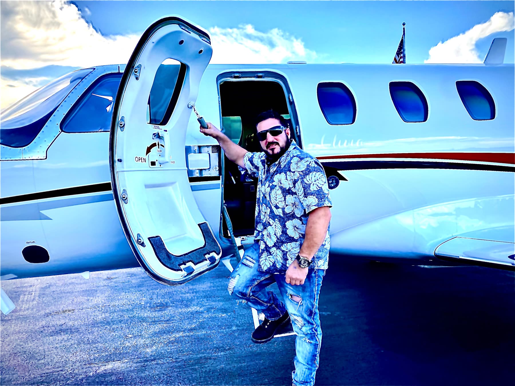 Barry Billcliff aviation profile photo beside a private jet